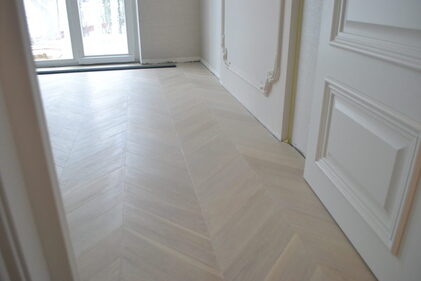 White Wood Flooring In Modern Interiors