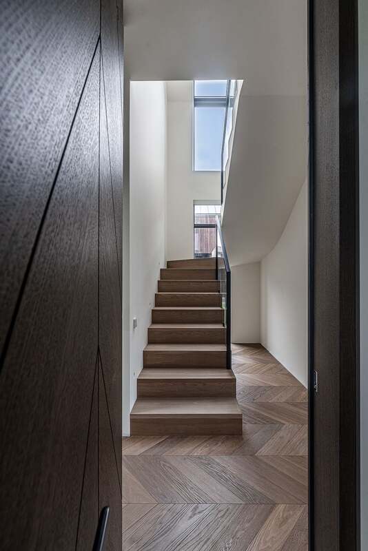 Chevron Parquet Wood Flooring and bespoke wood stairs treads and risers